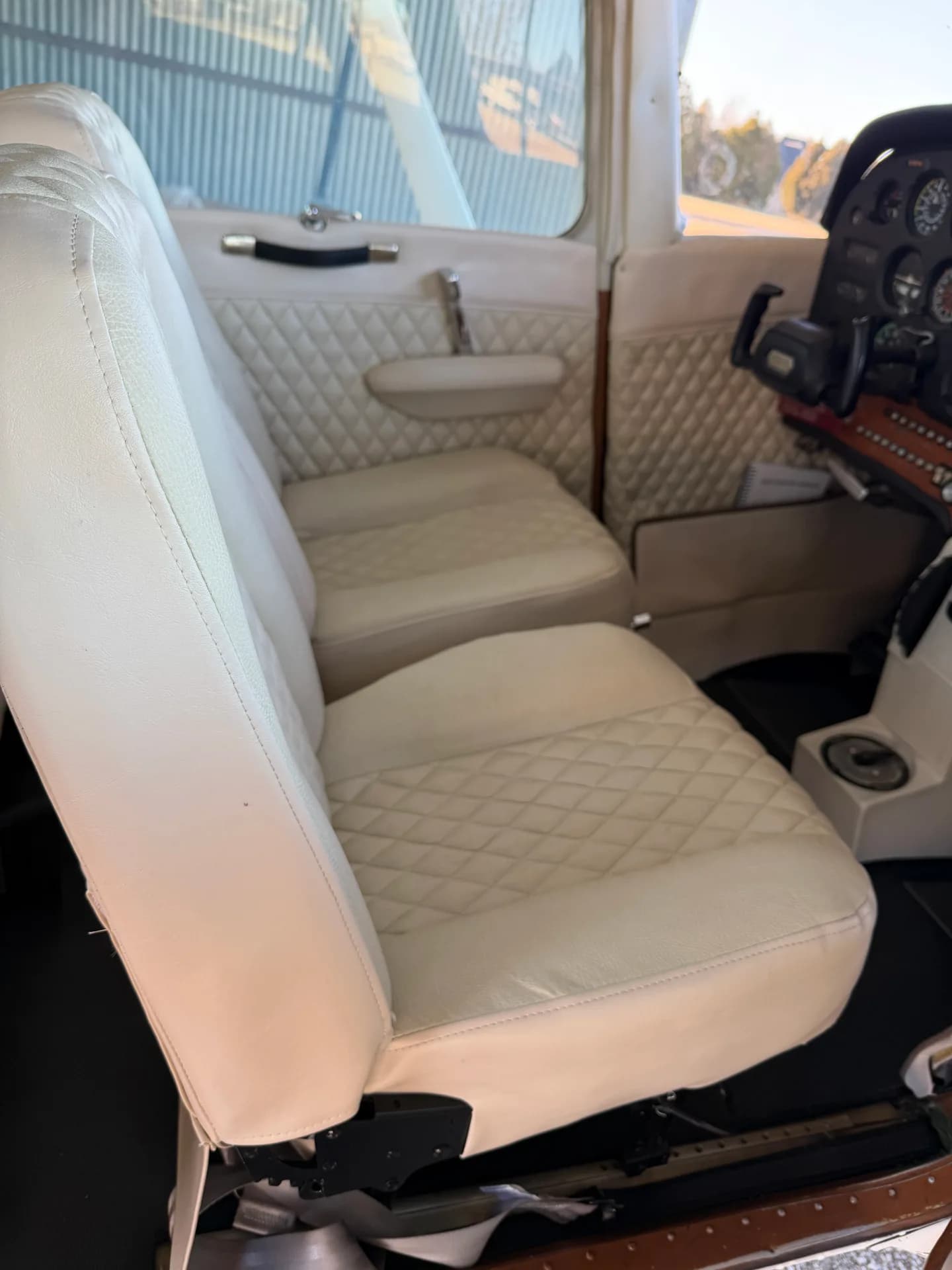 Cessna 172M front seats and center console viewed from passenger door